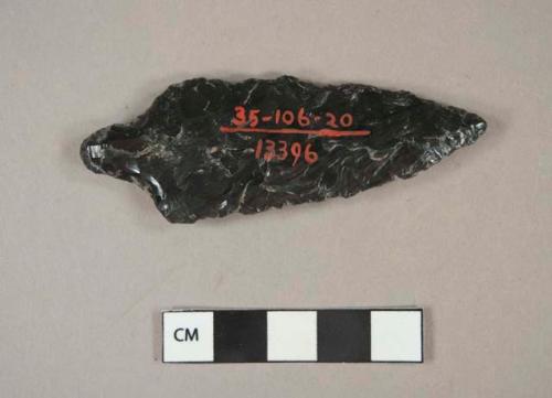 2 fragments of slighlty barbed obsidian arrowpoints
