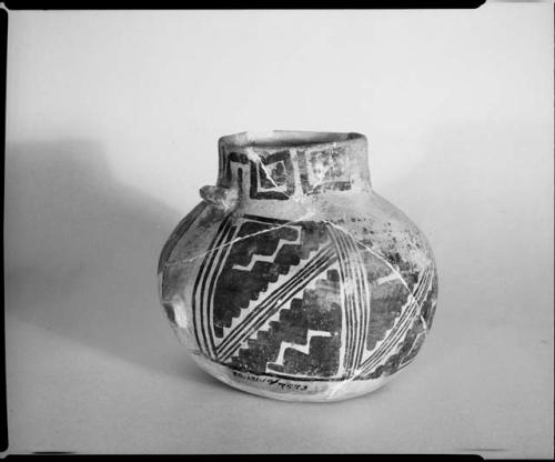 Photograph (missing) and negative of painted ceramics from the Jeddito Expedition, page 53