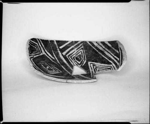 Photograph and negative of painted ceramics from the Jeddito Expedition, page 55