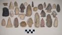 Chipped stone, scrapers, flakes, perforators, projectile points, and bifaces