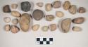 Pebbles and stone fragments; worked bone fragment; burned and calcined bone fragments; shell fragments