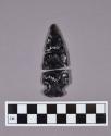 Obsidian projectile point, corner-notched, broken and pieces cross-mend