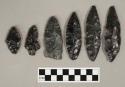 Retouched obsidian blades, 7 leaf shaped, 2 side notched, 2 stemmed. 3 blades are partial.