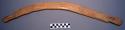 Rabbit stick, carved wood, curved, with handle, flat, tapered end