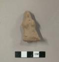 Ceramic figurine, moulded anthropomorphic, female?  brown slip, broken