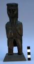 Uchu: Male figure holding cross 7 1/2 " high (Uchu/figurine)