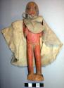 Doll representing shaman with cape