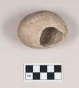 Ground stone, partially perforated stone, possible pipe bowl preform