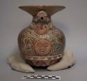 Ceramic jar, human effigy, molded headdress, facial features, ear ornaments, mol