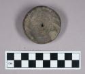 Ground stone, partially perforated disk, possible spindle whorl