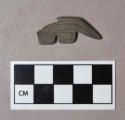 Ground stone, ornament fragment, perforated, incised and notched