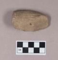 Ground stone, partially perforated stone object, possible pipe fragment