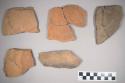 76 unslipped body potsherds of relatively soft & thick ware with small proportio