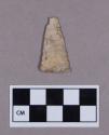 Chipped stone, projectile point, triangular, fragmented tip