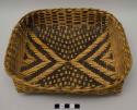 Scoop-shaped winnowing basket