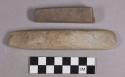 Ground stone, wedged-shaped edged tool with abraded end and tapered, rectangular fragment