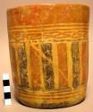 Complete ceramic vase, polychrome geometric design, grooved, reconstructed