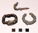 Fragment of hook, fragment of ring, and fragment of belt