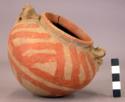 Pottery jar with constricted neck and two modelled figure lugs - Red Line ware