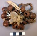 Chief's charm - made from dried fruits, nuts; shells; colored beads