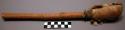 Drum stick with padded end of buckskin stuffed with deer's hair and fringed.