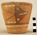 Small cup with geometric design