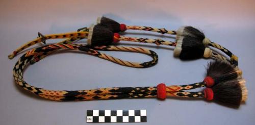 Modern quirt. Dyed horse hair and leather thongs