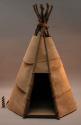 Tee pee model made of birch bark and wooden sticks