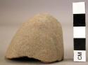 Pebble hammerstone fragment - well abraded on one end
