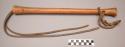 Sioux quirt. Wood handle. 2 commercial leather lashes