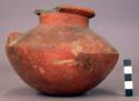 Pottery jar with constricted neck and two lugs, chipped lip - Red ware