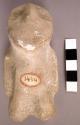 CAST, moulded and incised human figure, chipped