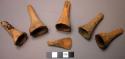 5 small wooden funnels(?), possibly tobacco holders(?)