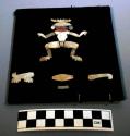 Shell inlay of human figure - red shell face, turquoise eyes