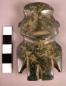Polished serpentine (?) figure, mezcala-type.  Wing-like projections for arms.