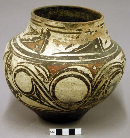 Jar, polacca polychrome style b. Zuni rain bird design.