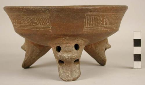 Pottery bowl - tripod feet; burnished and incised