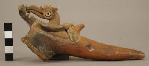 Tripod pottery vessel leg - represents a bird fertilizing a human being