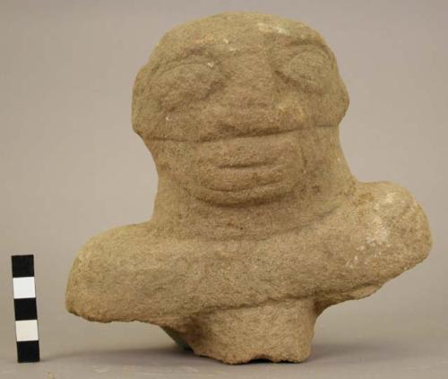 Stone head from figure