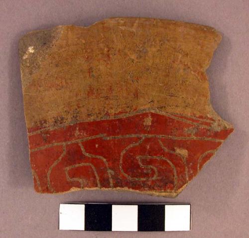 1 of 4 red on tan pot sherds with incising on the red part