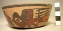 Small polychrome pottery bowl with humming bird  design