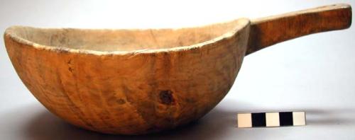 Wooden bowl with handle (ladle?)