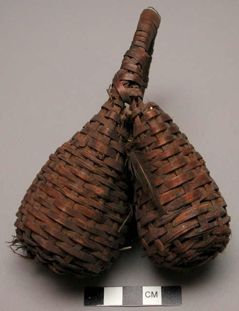 Double basket rattle used in um cult