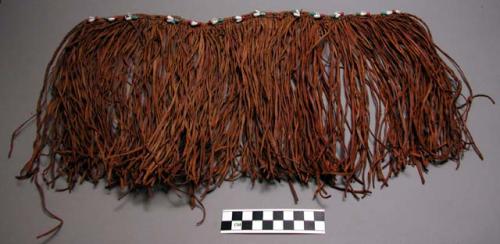 Skirt, leather fringe, braided band & straps, shell & bead deco, some fragments