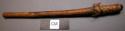 Unclassified tool, stick w/ 1 end burnt & wrapped w/ vegetable fiber at 1 end