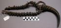Cow charm - collar hung with wooden knobs, iron rings, medicine horn, tusk and n