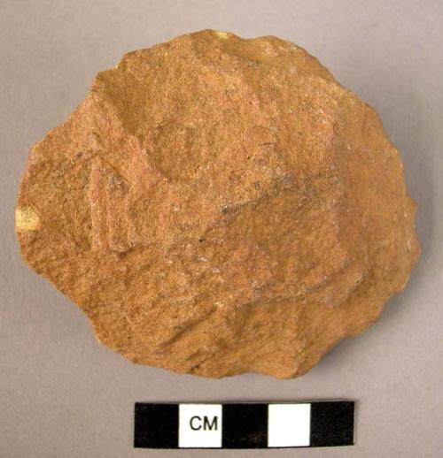 Quartzite disc, extensively flaked on both sides