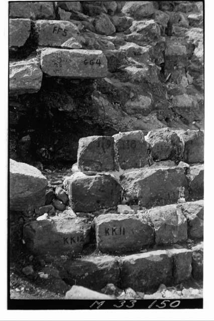 Lower steps reset to row II at the Main Stairs of Monjas