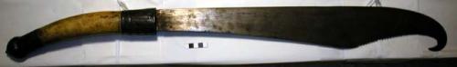 Large sword with curved and saw-like blade; ivory handle, and +