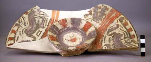 Fragment of polychrome pottery plate - shaped like oyster dish